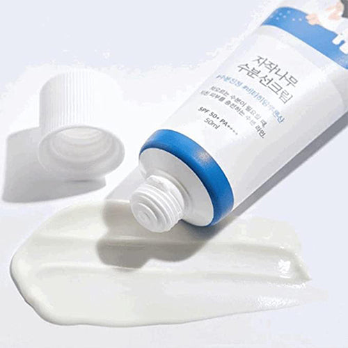 Round Lab Birch Juice Moisturizing Sun Cream SPF 50+ PA++++ tube with cream texture.