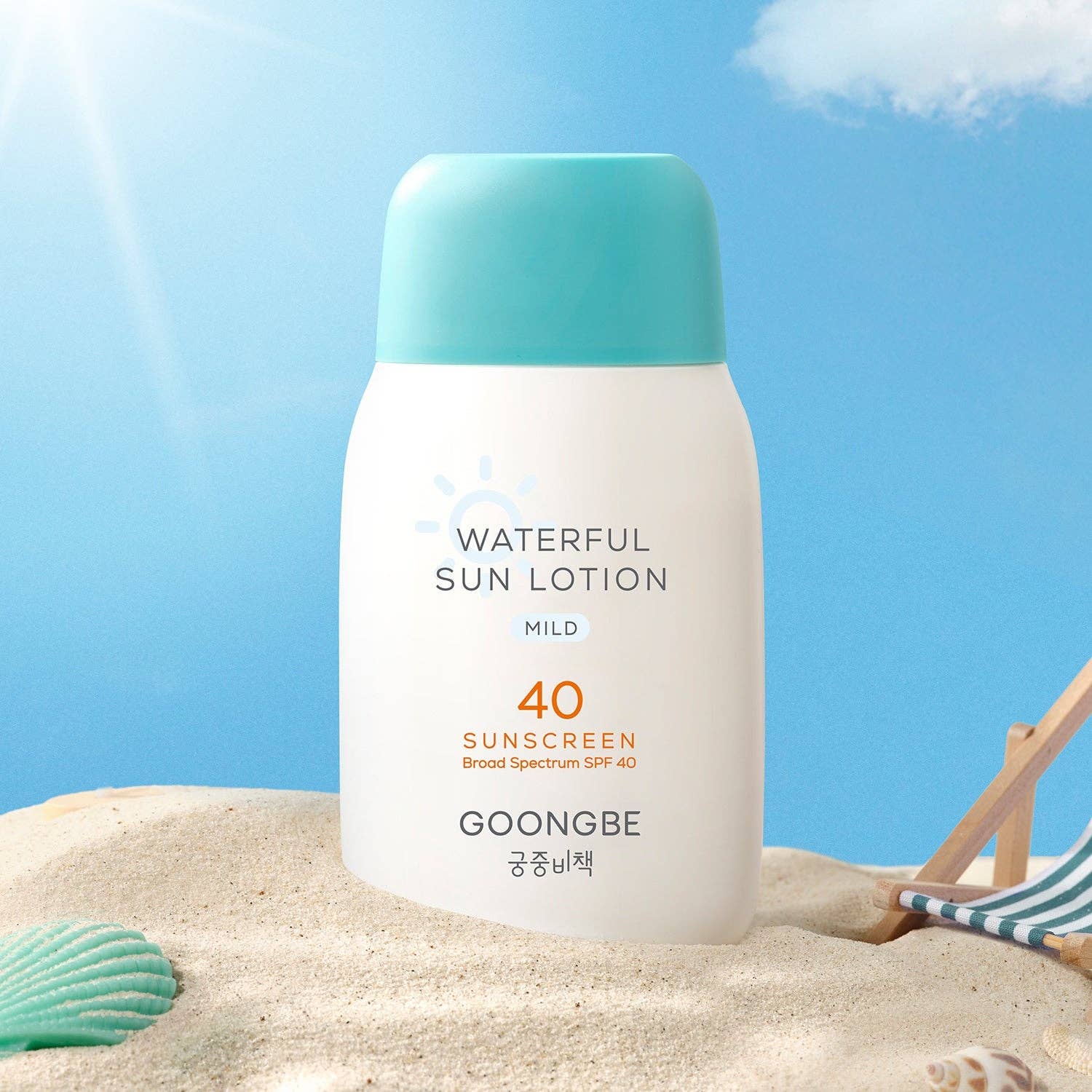 Sun lotion bottle with blue cap on sand against a blue sky
